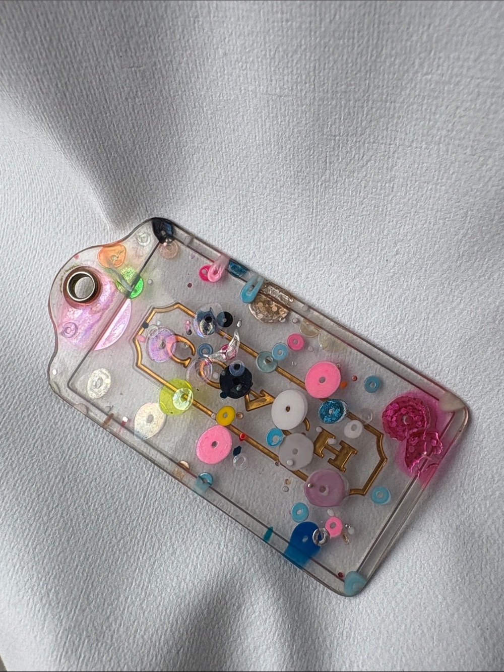 Coach Clear Confetti Hang Tag with Gold Logo - Picture 2 of 3